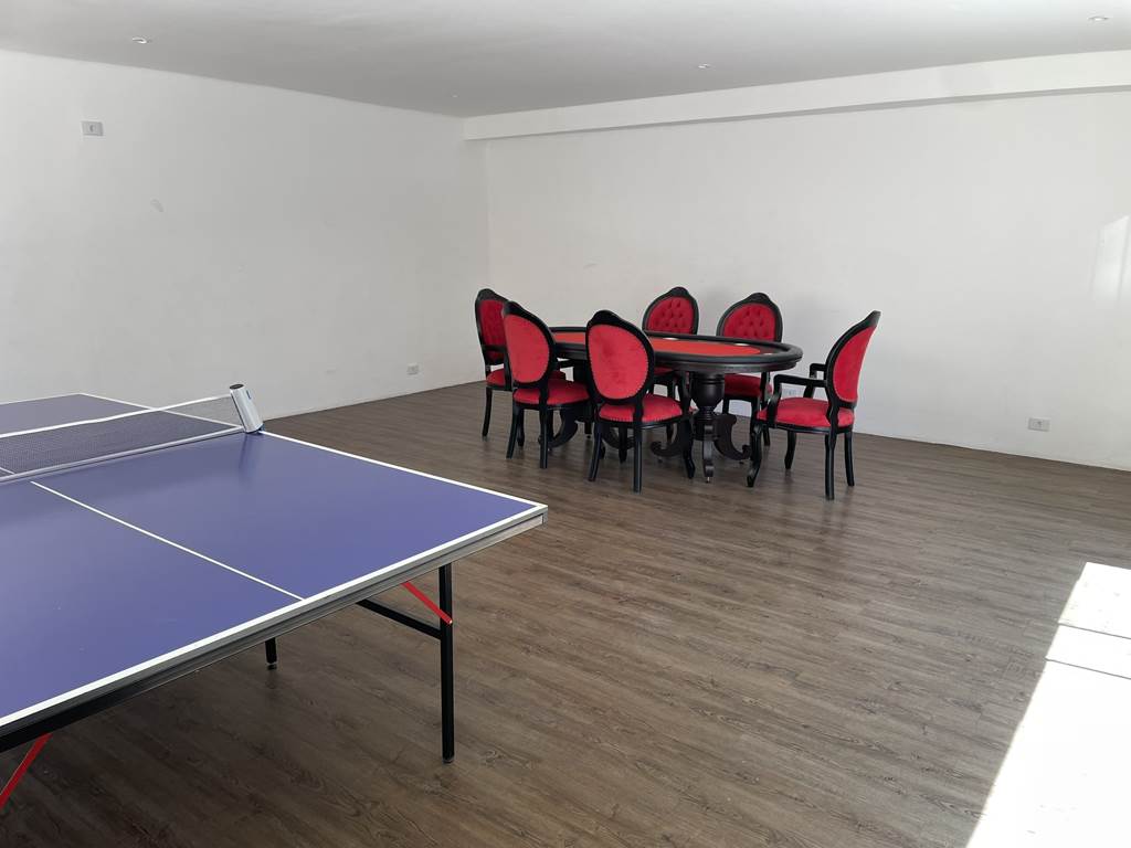 Espaço gourmet e área de lazer do condomínio